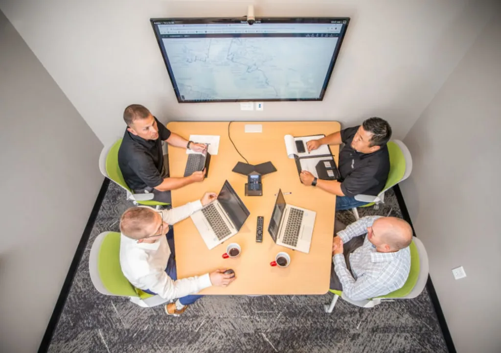 stakeholders communicating during a project approach in construction meeting