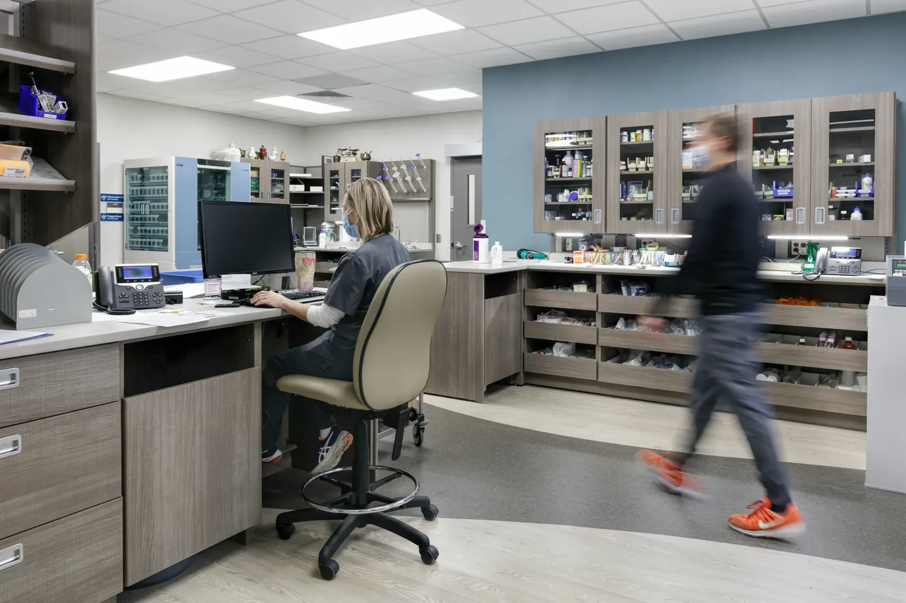 Employees working at the new olathe health medical center pharmacy addition by McCownGordon