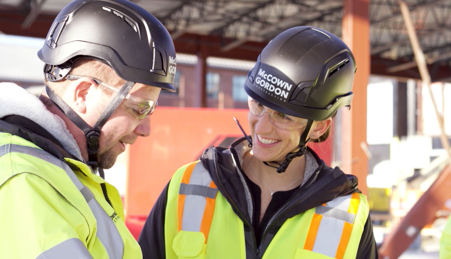 Two Project Engineers collaborating on a jobsite