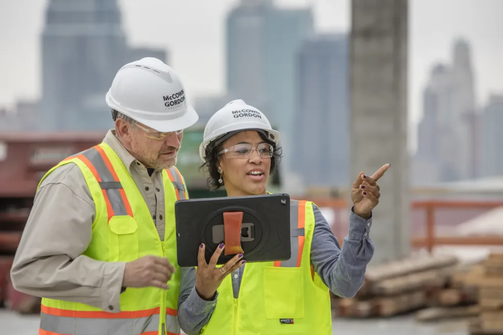 construction workers working on an occupied or tight jobsite project