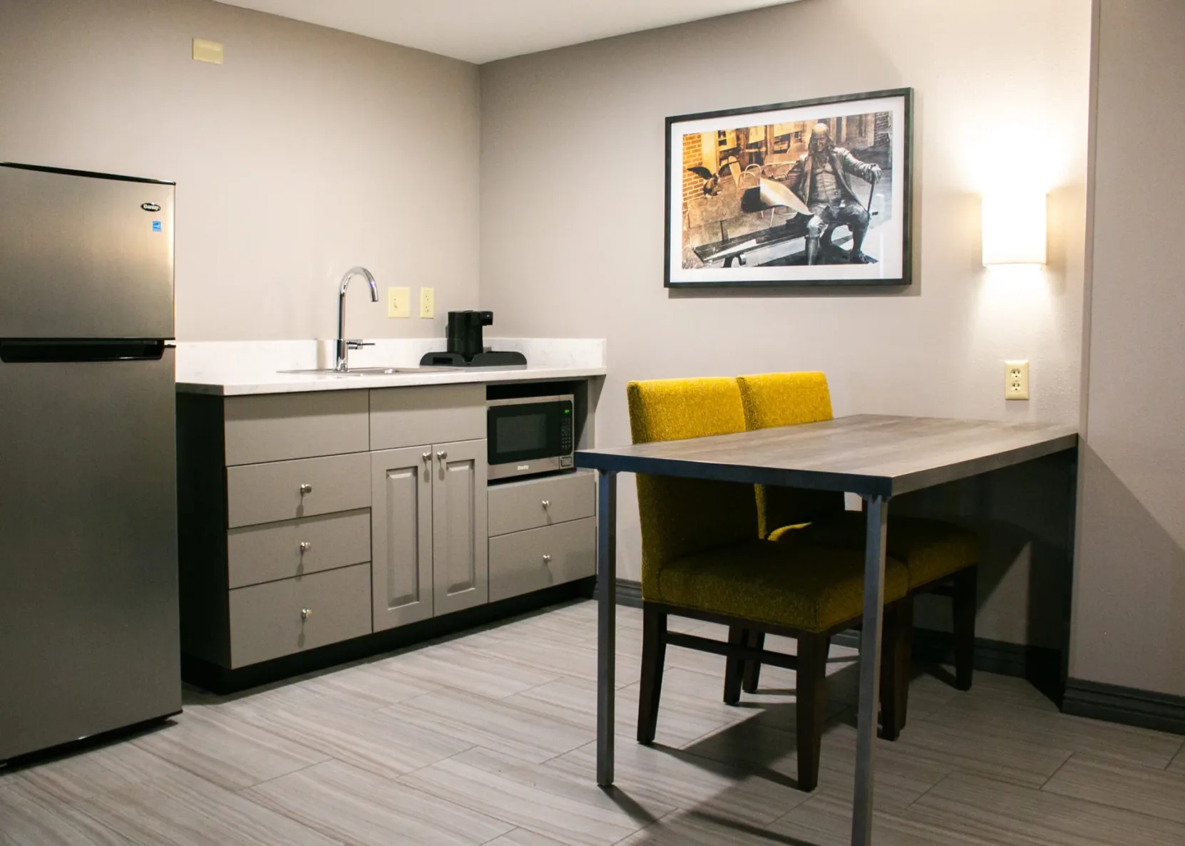 A kitchen area inside a room at Hampton Inn KC