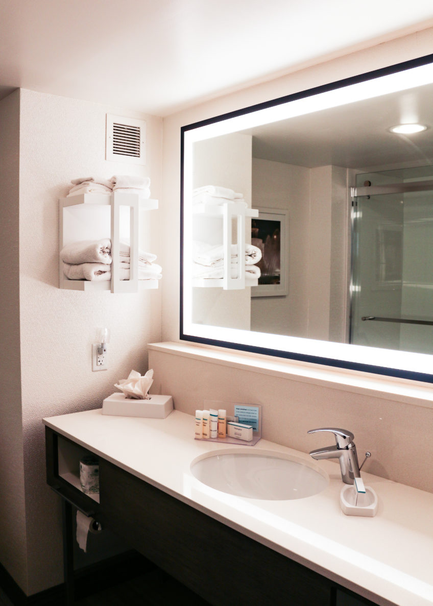A photo inside a bathroom at Hampton Inn & Suites KC, renovated by McCownGordon Construction