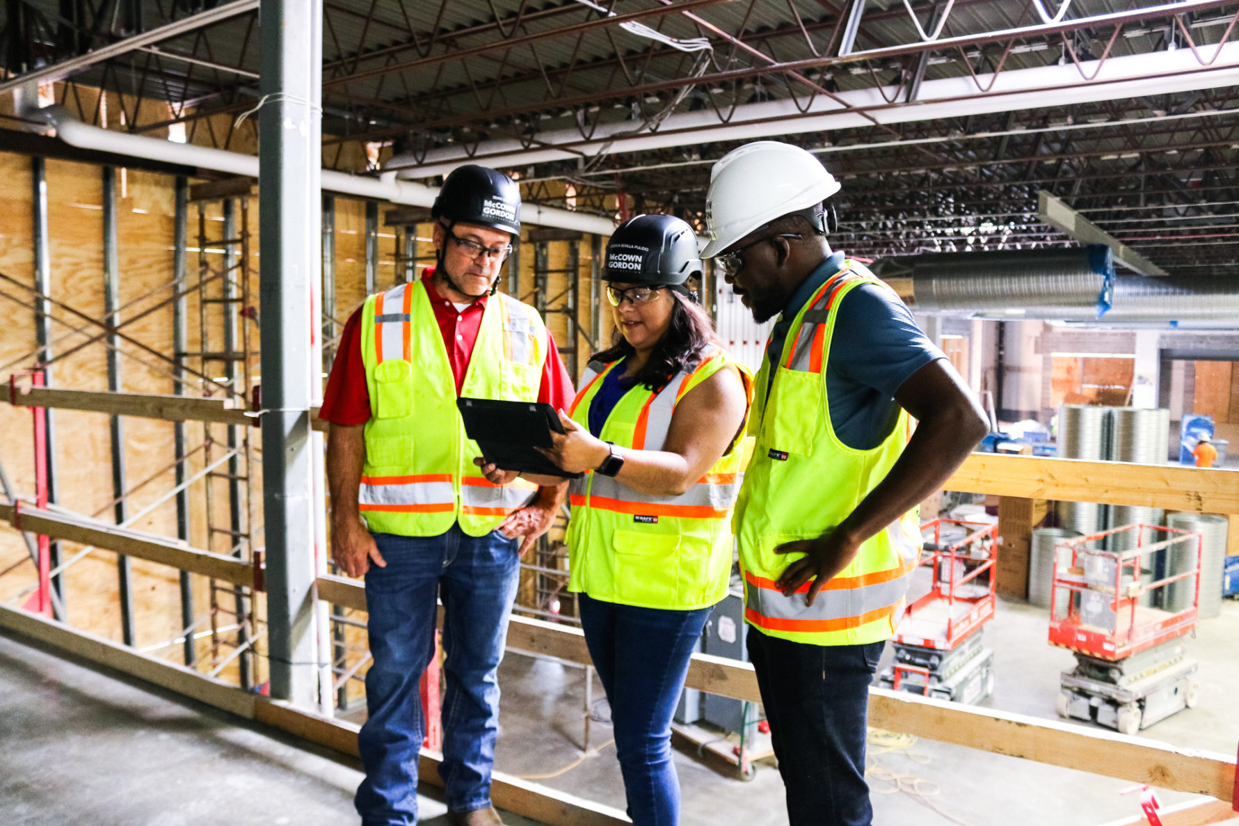 Three McCownGordon associates on a construction jobsite