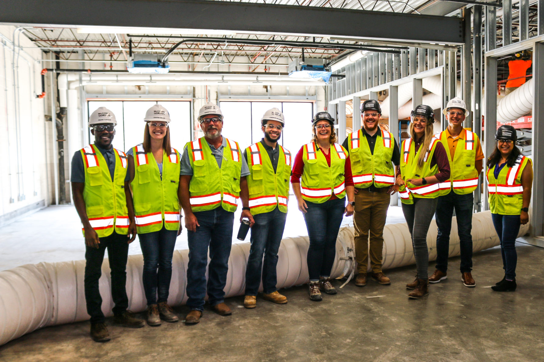 McCownGordon's past interns who are now associates at a construction site
