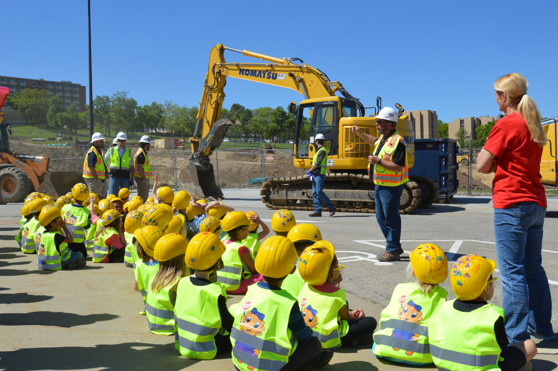 Students in hardhats at a McCownGordon job site
