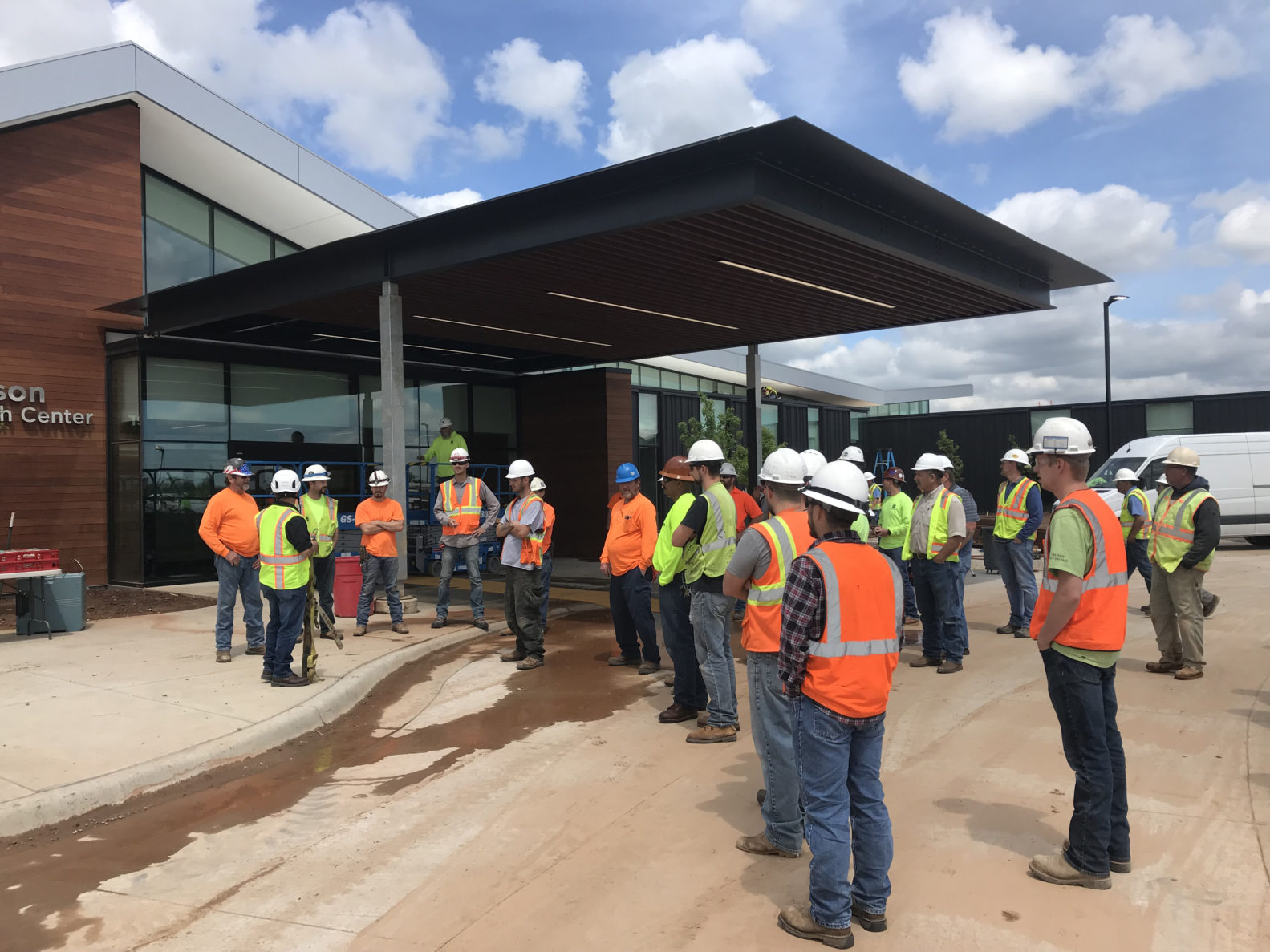 A safety meeting taking place on a McCownGordon Construction project site