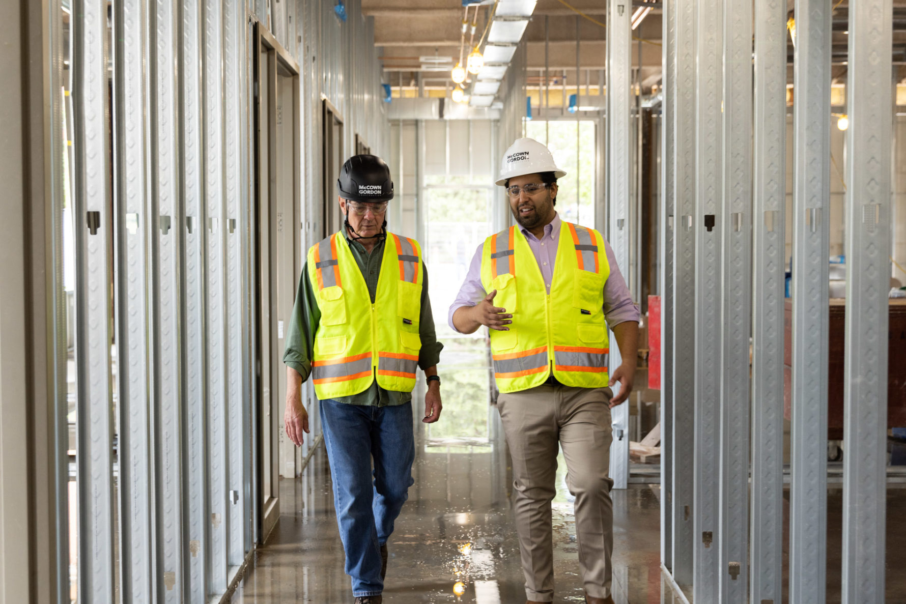 A McCownGordon associate and an owner walking a construction site