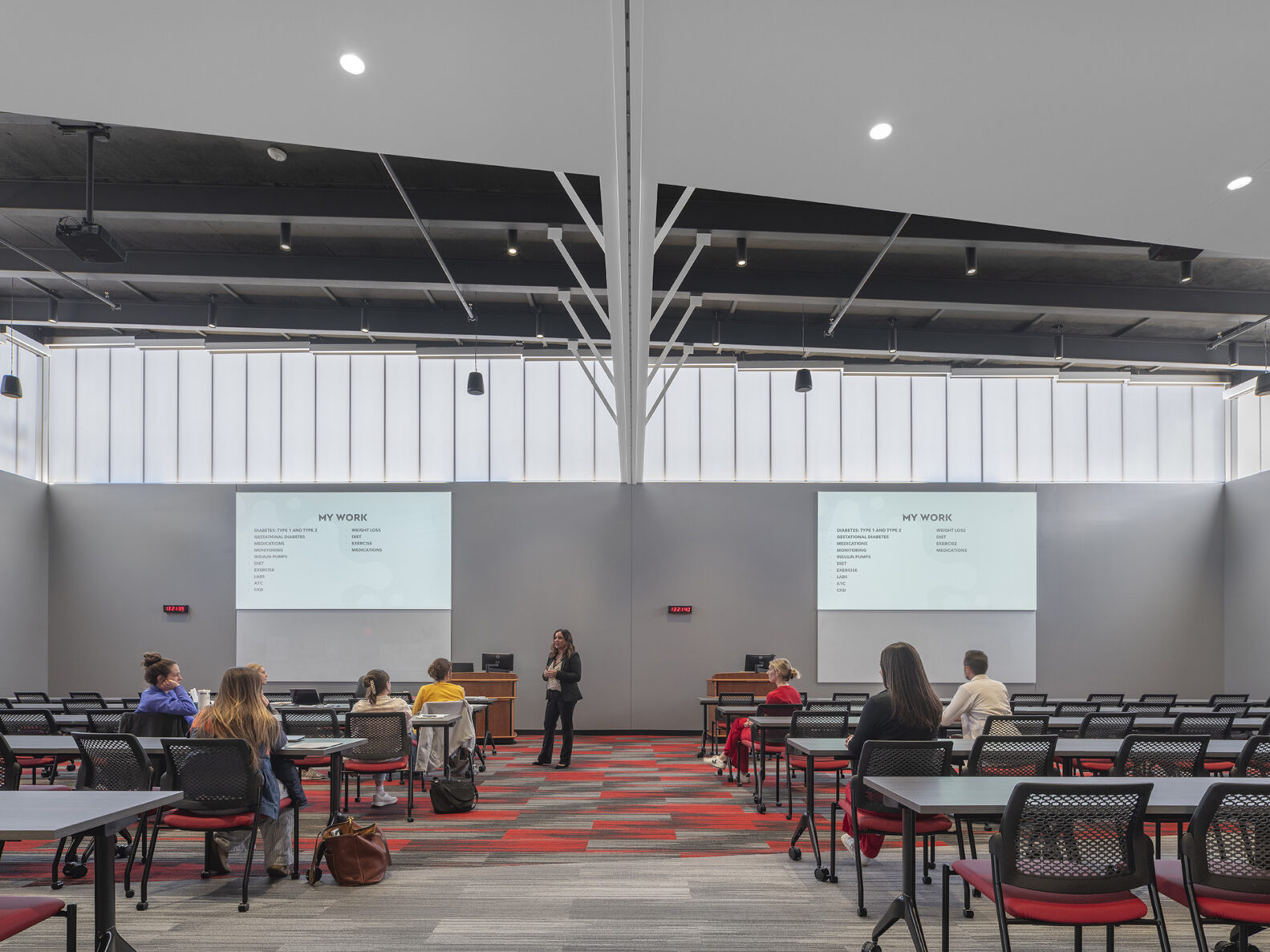 Students sitting in a large lecture hall at Pitt State University