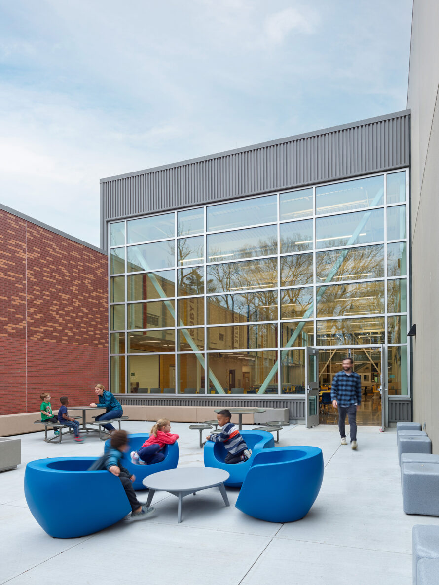 Students talking outside at Davidson Elementary School which was built by MccownGordon in North Kansas City