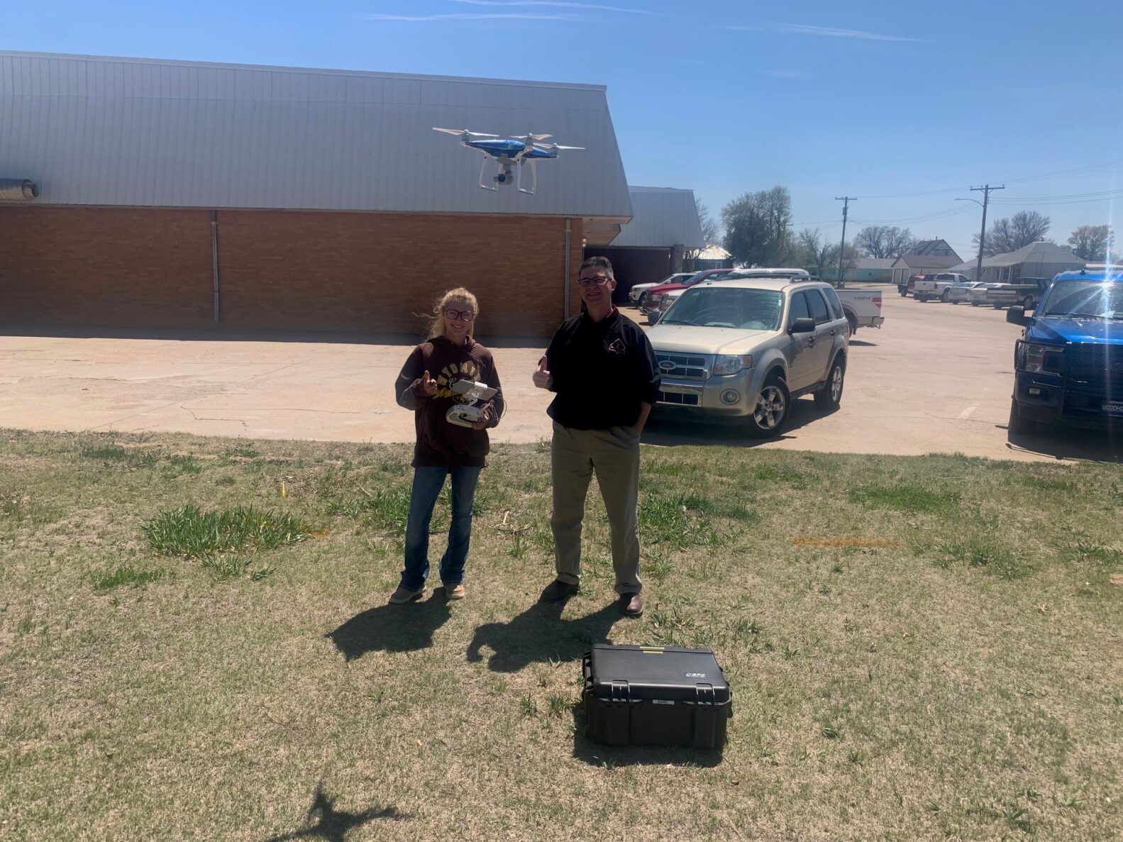 Students a Logan Intergenerational' s drone class learn how to fly a construction drone.