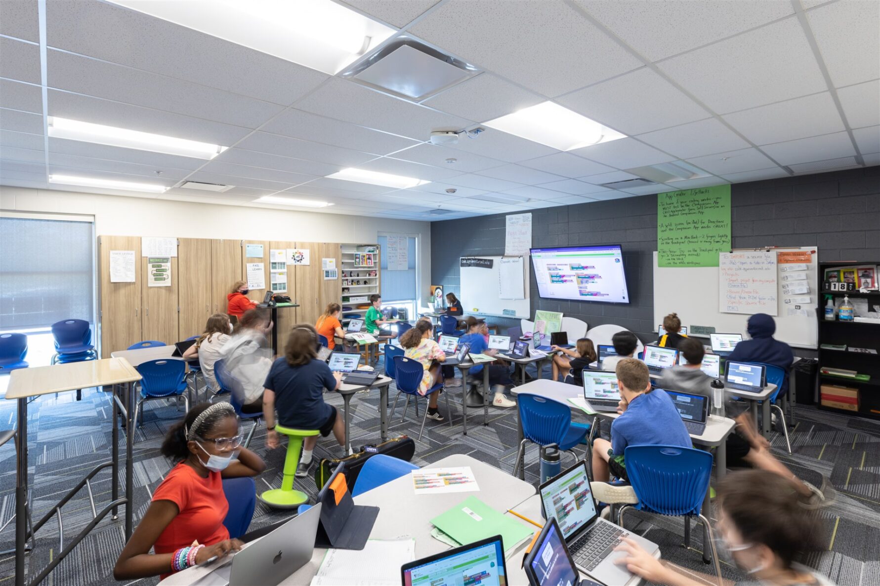 Students learning in a classroom at the NKC Gateway 6th Grade Center, renovated by McCownGordon Construction