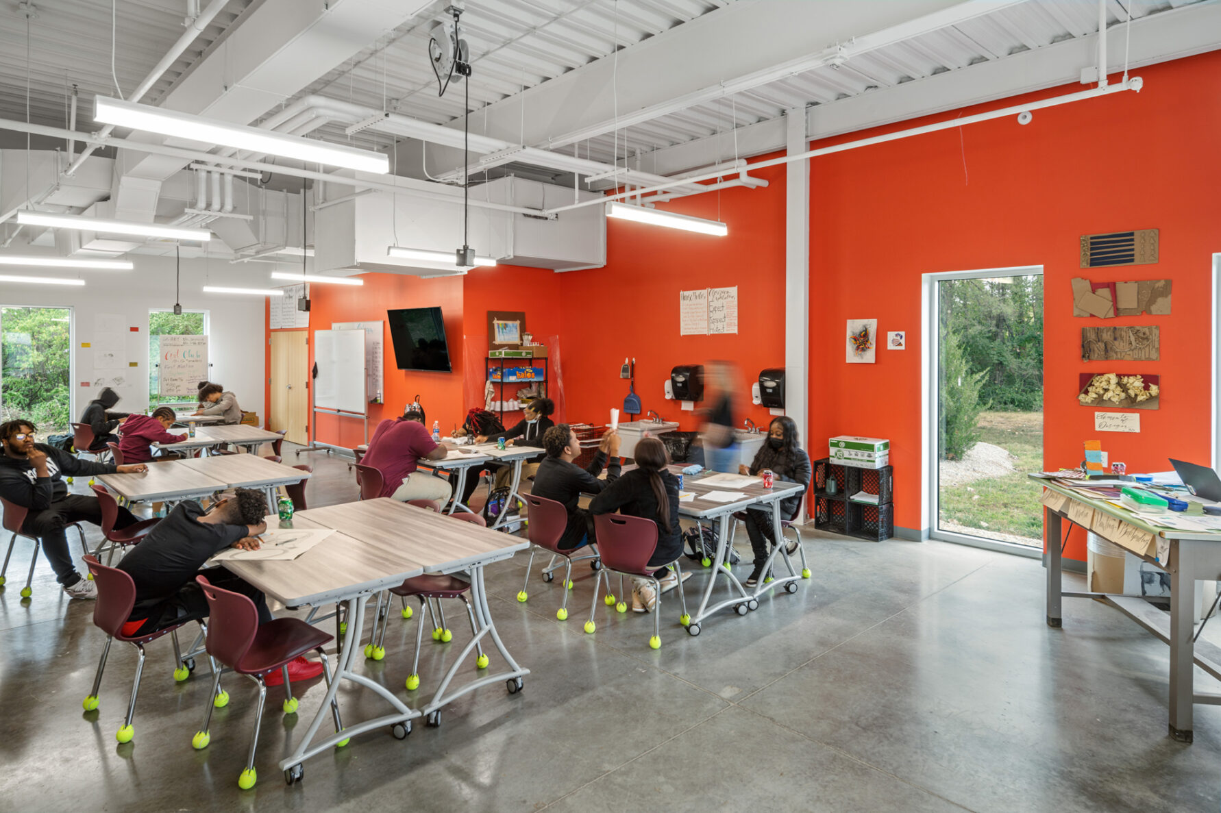 Students learning in a classroom at Hogan Prep High School, built by McCownGordon Construction