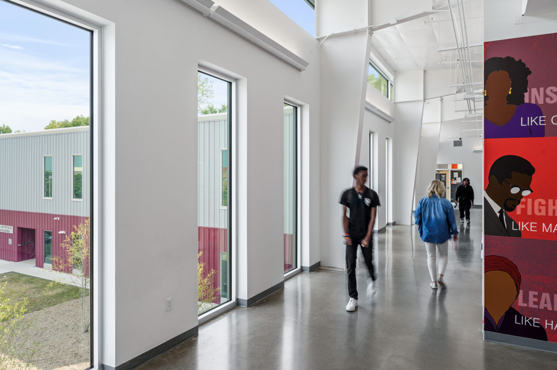 Students walking in the hallway at Hogan Prep High School, built by McCownGordon Construction