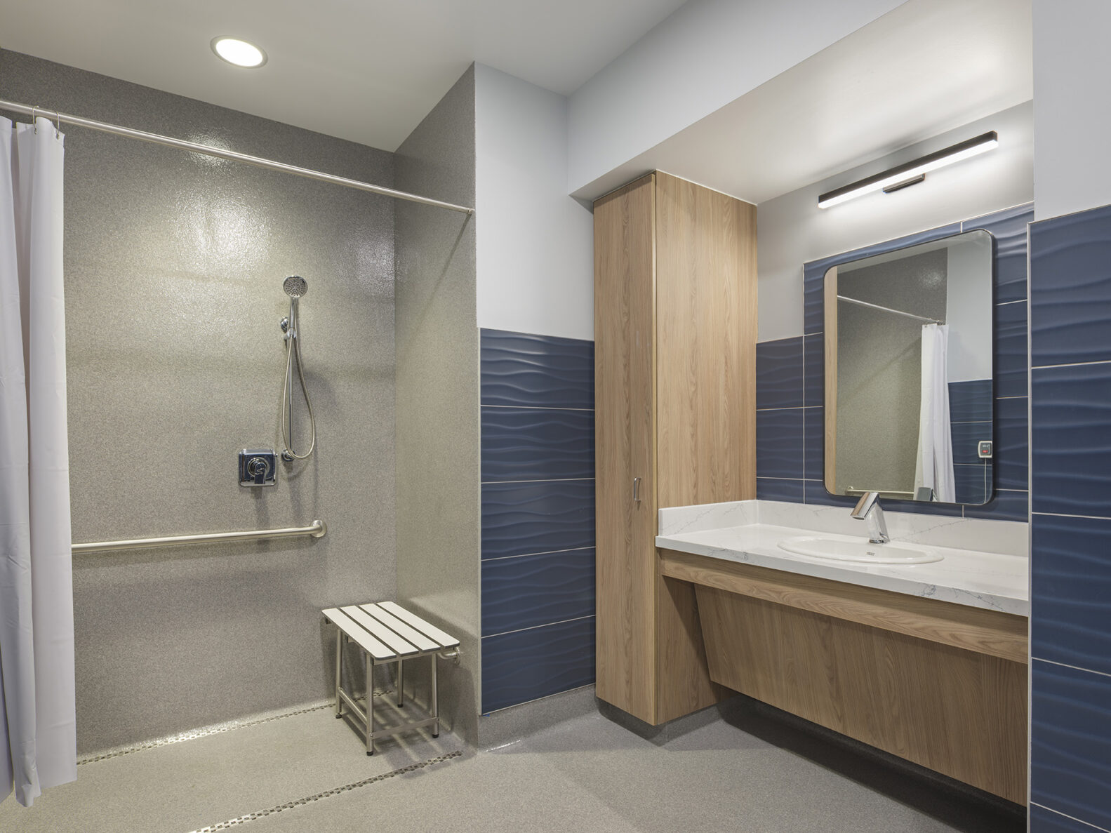 Patient bathroom at PACE KC Swope Health Adult Wellness Center, built by McCownGordon