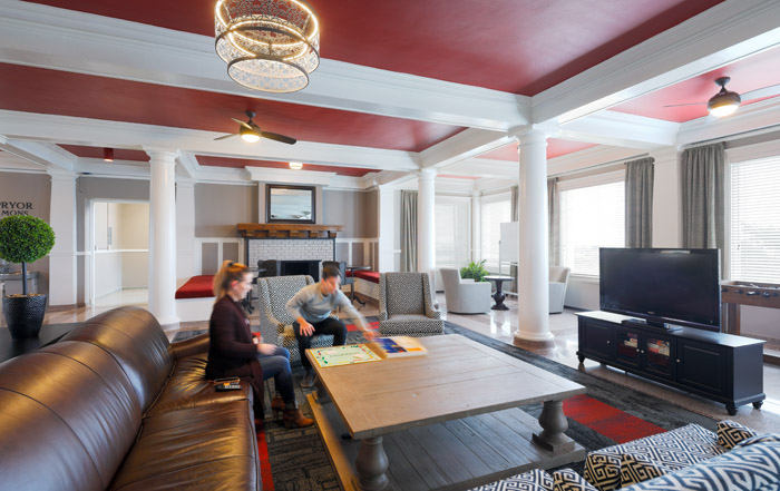 Students hanging out in a common area of their residence hall