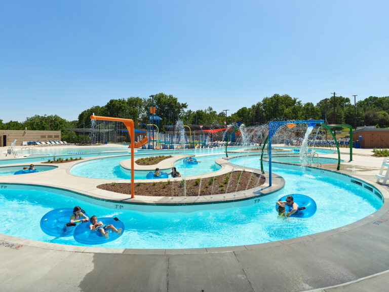 kids using the lazy river at the City of Lenexa Indian Trails, built by McCownGordon Construction