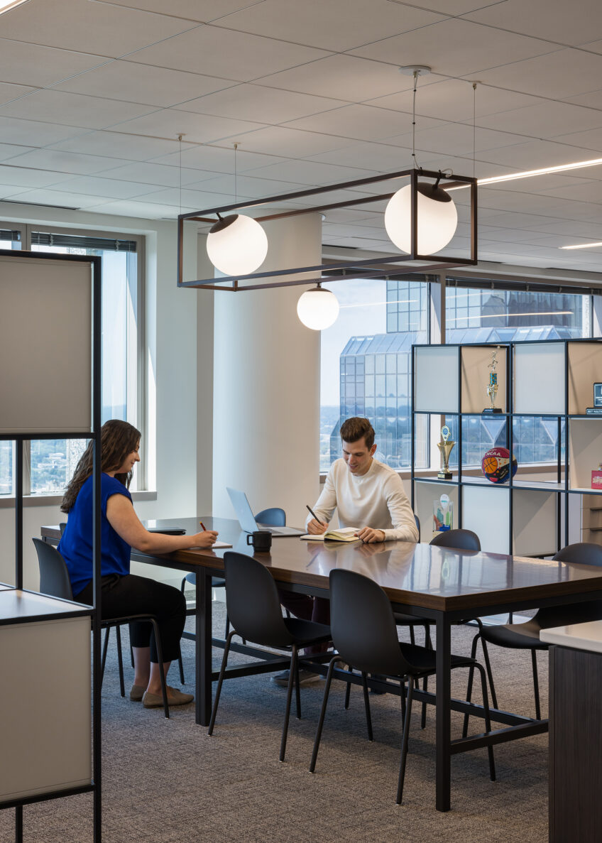 Associates working at a desk together