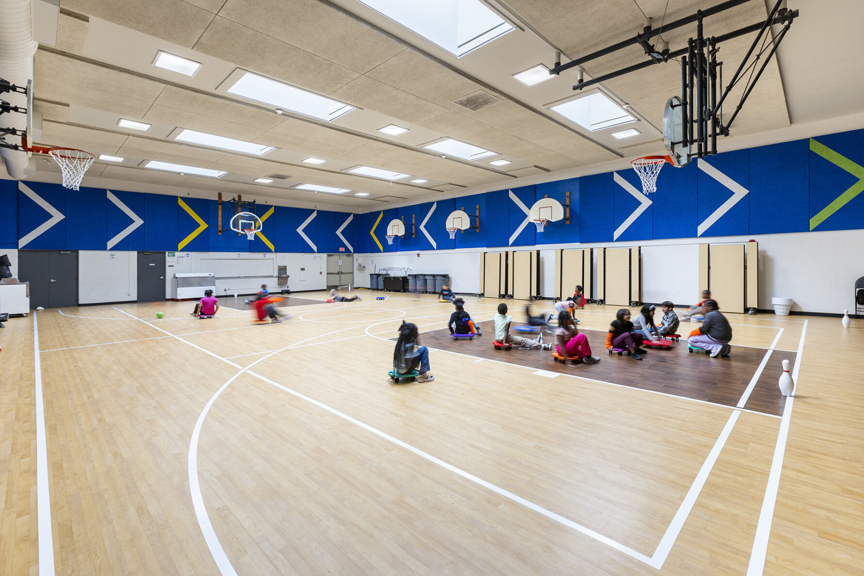 Students playing in the gymnasium at Burke Elementary