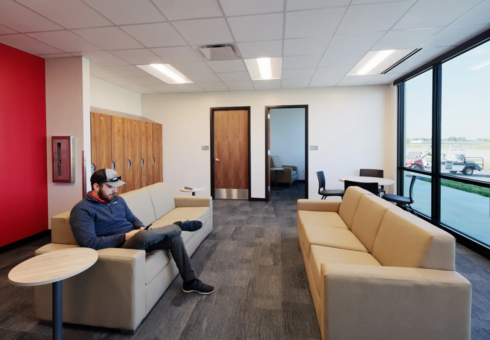 Student hanging out in the pilot's lounge at UCM's SkyHaven Terminal and Flight School.