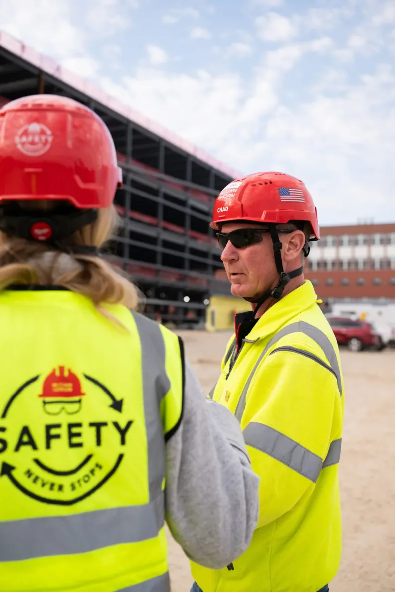 Two McCownGordon Construction associates talking on a jobsite