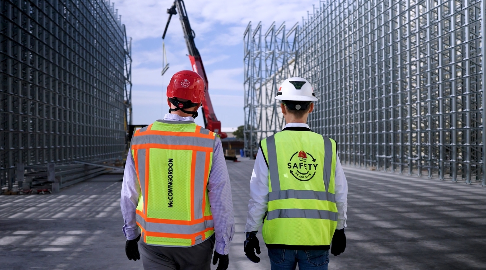McCownGordon associate walking with an owner on an industrial manufacturing jobsite