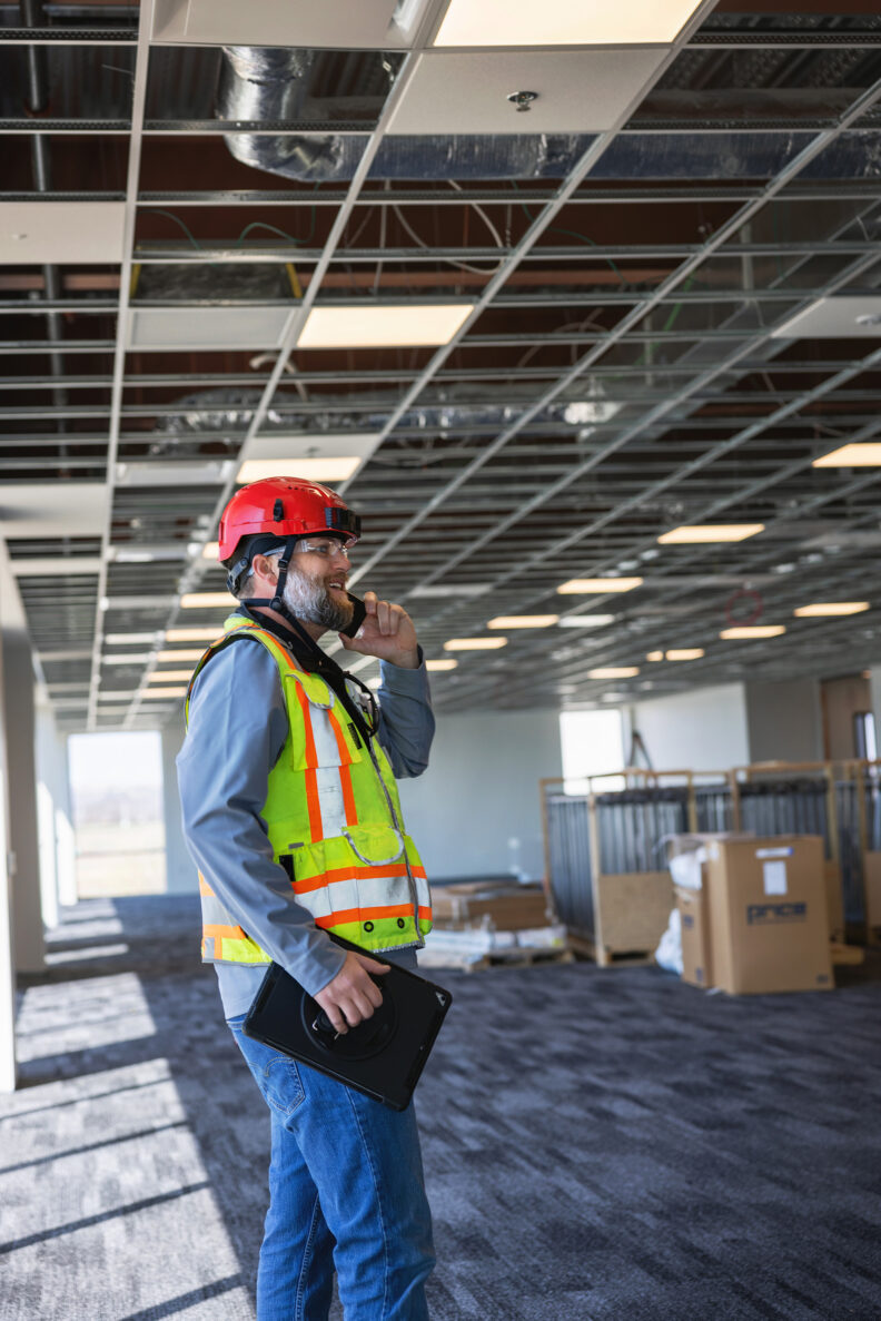 McCownGordon associate calling on jobsite.