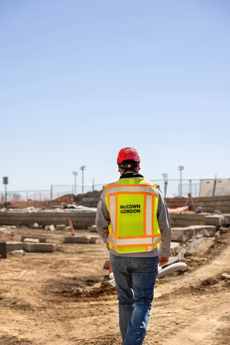 McCownGordon associate looking at jobsite.