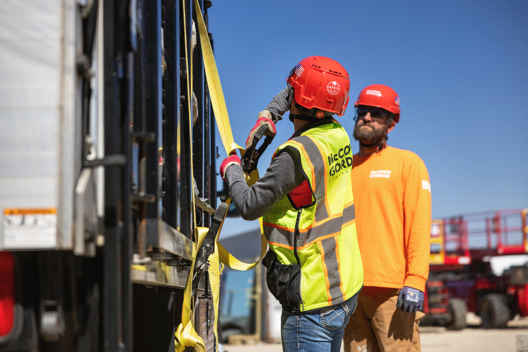 McCownGordon associates talking on jobsite.