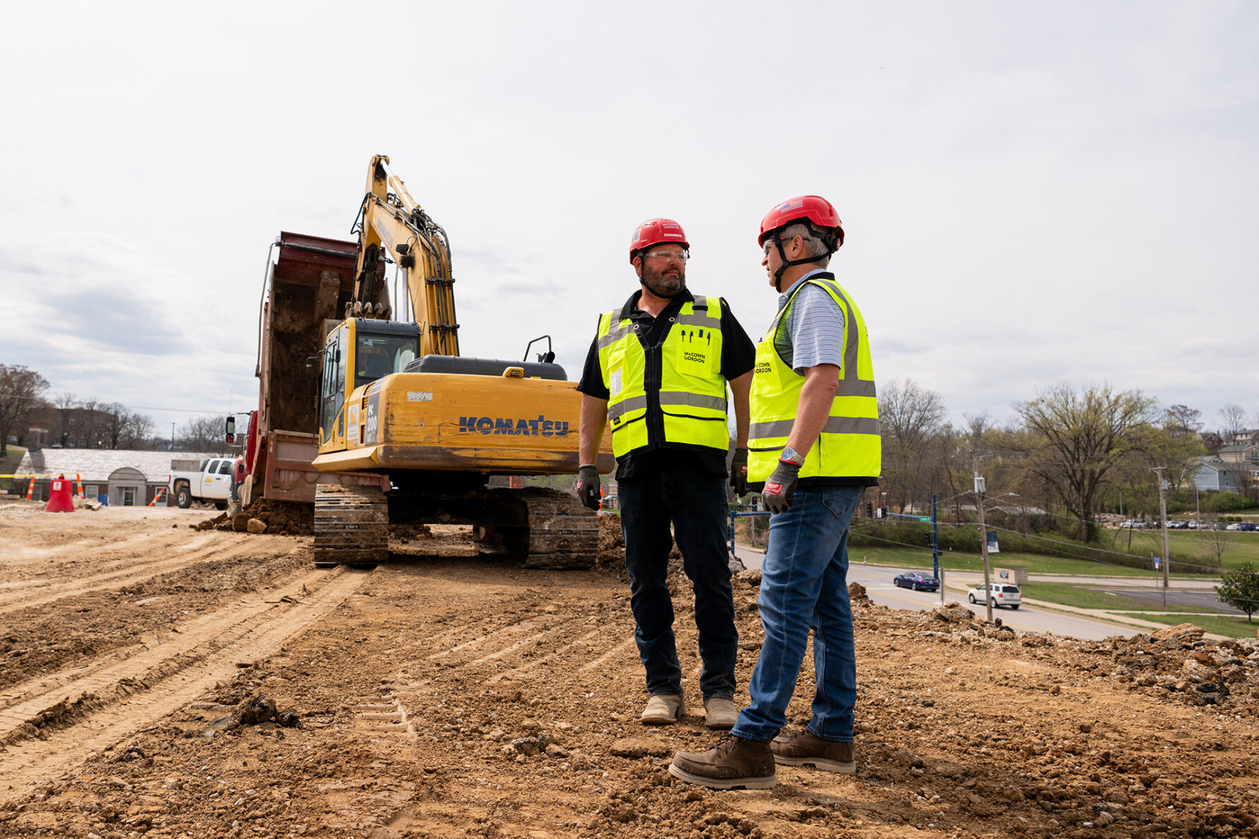 McCownGordon associates talking on jobsite.