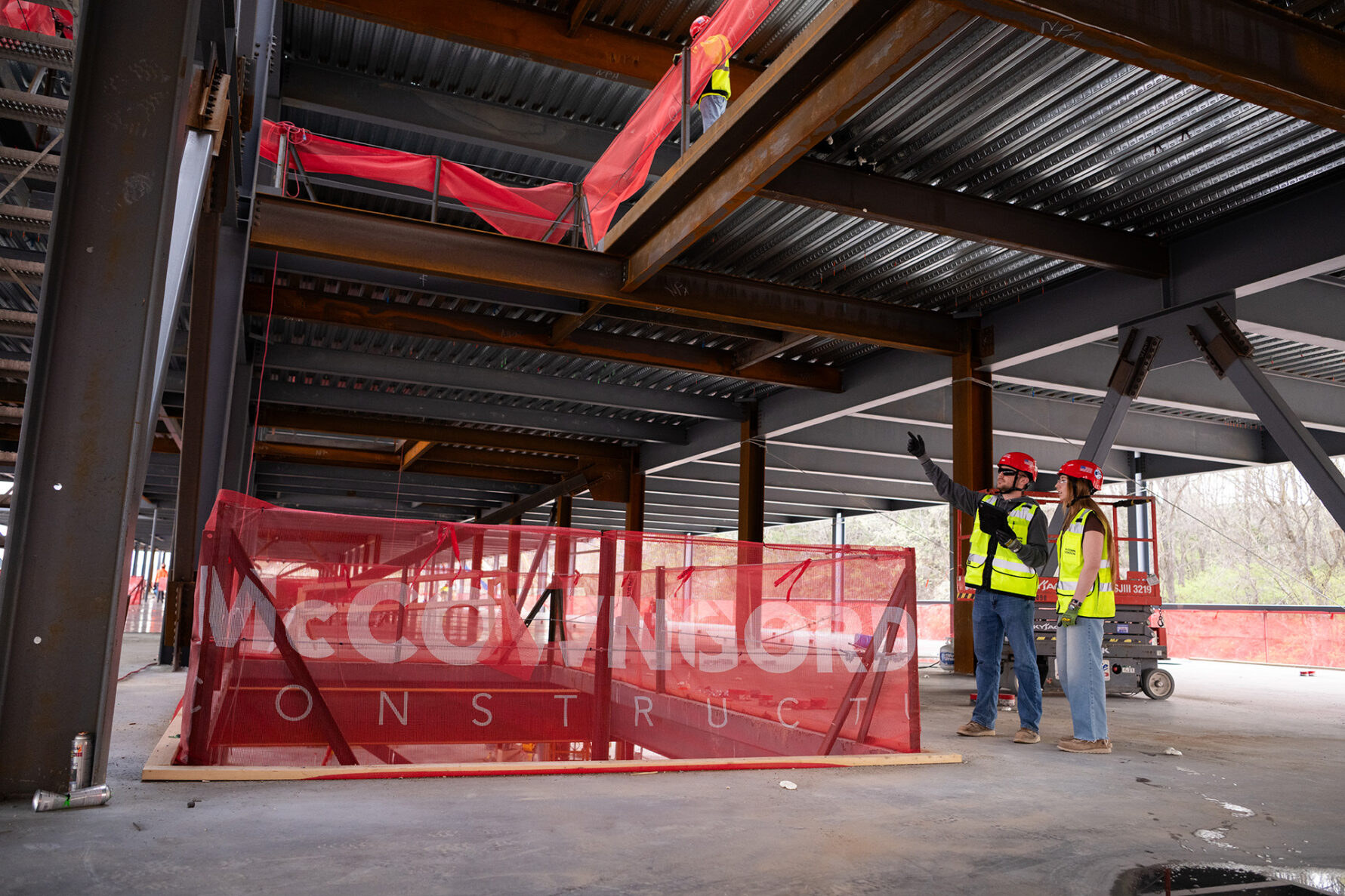 McCownGordon associates talking on jobsite.