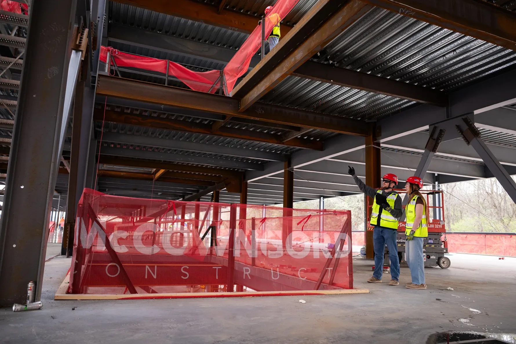 McCownGordon associates talking on jobsite.