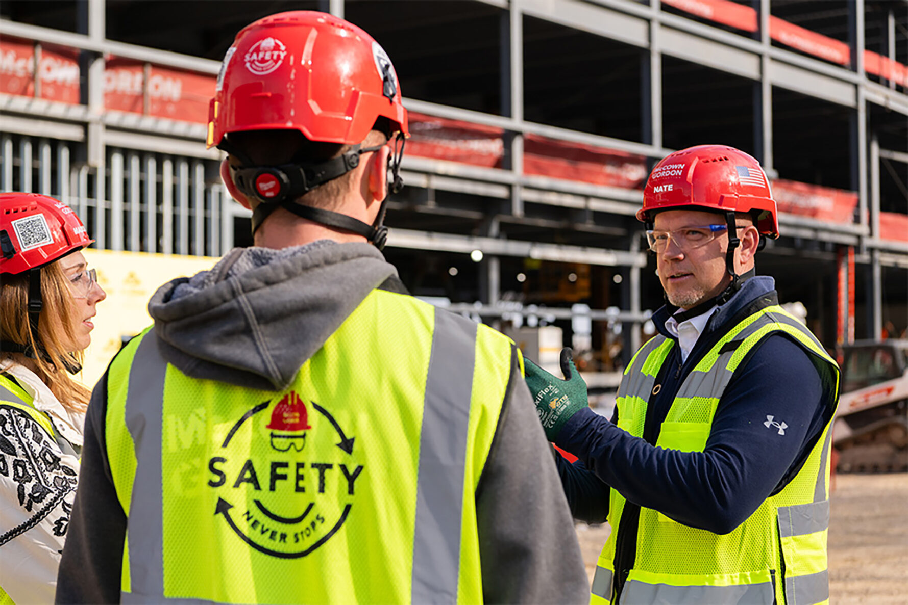 McCownGordon associates talking on jobsite.