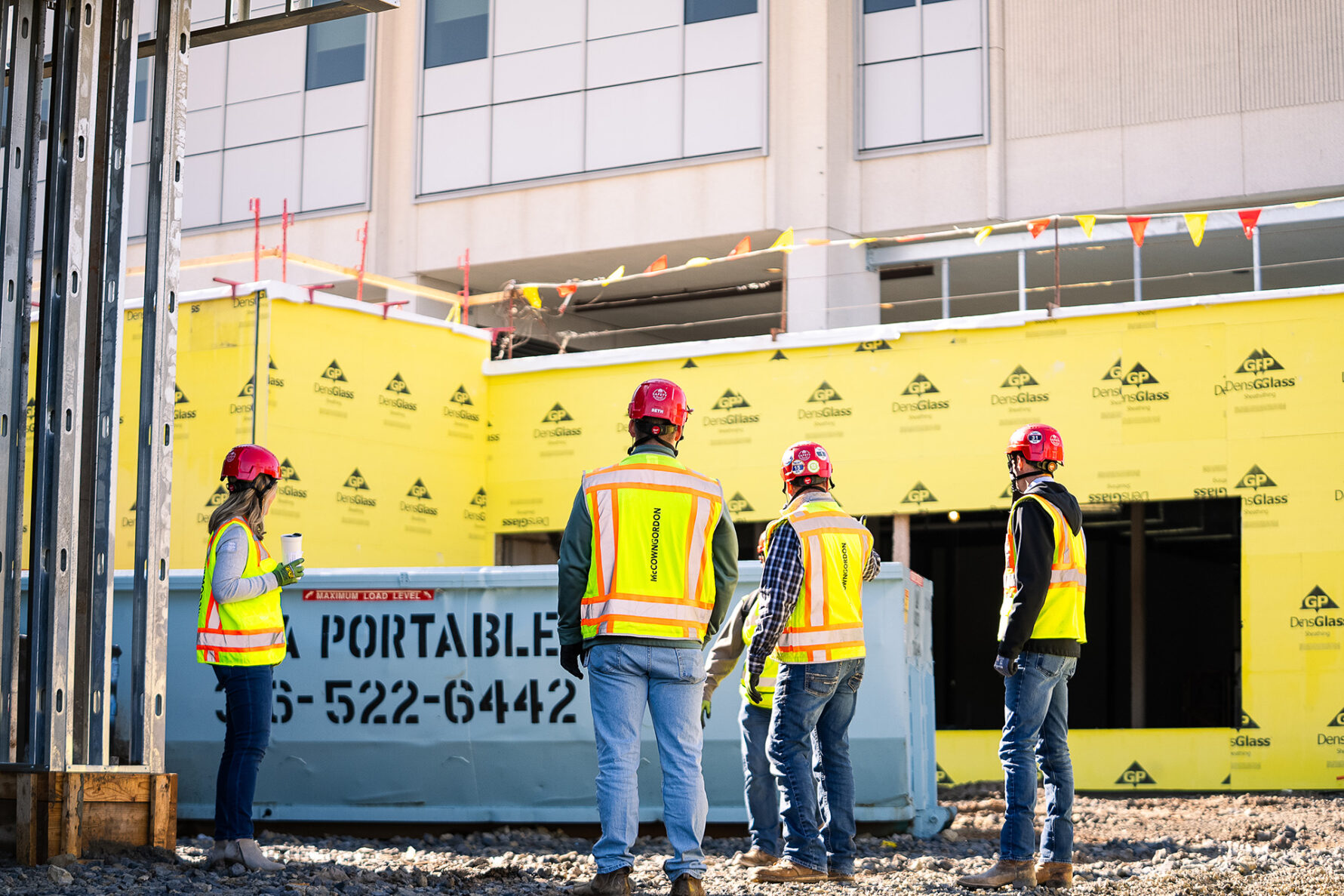 McCownGordon associates looking at jobsite.