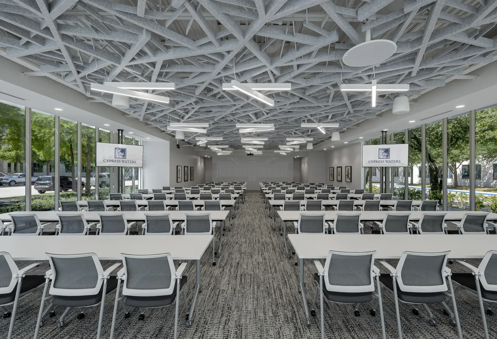 Empty conference space filled with tables at White Rhino Coffee and Conference Center in Dallas Texas