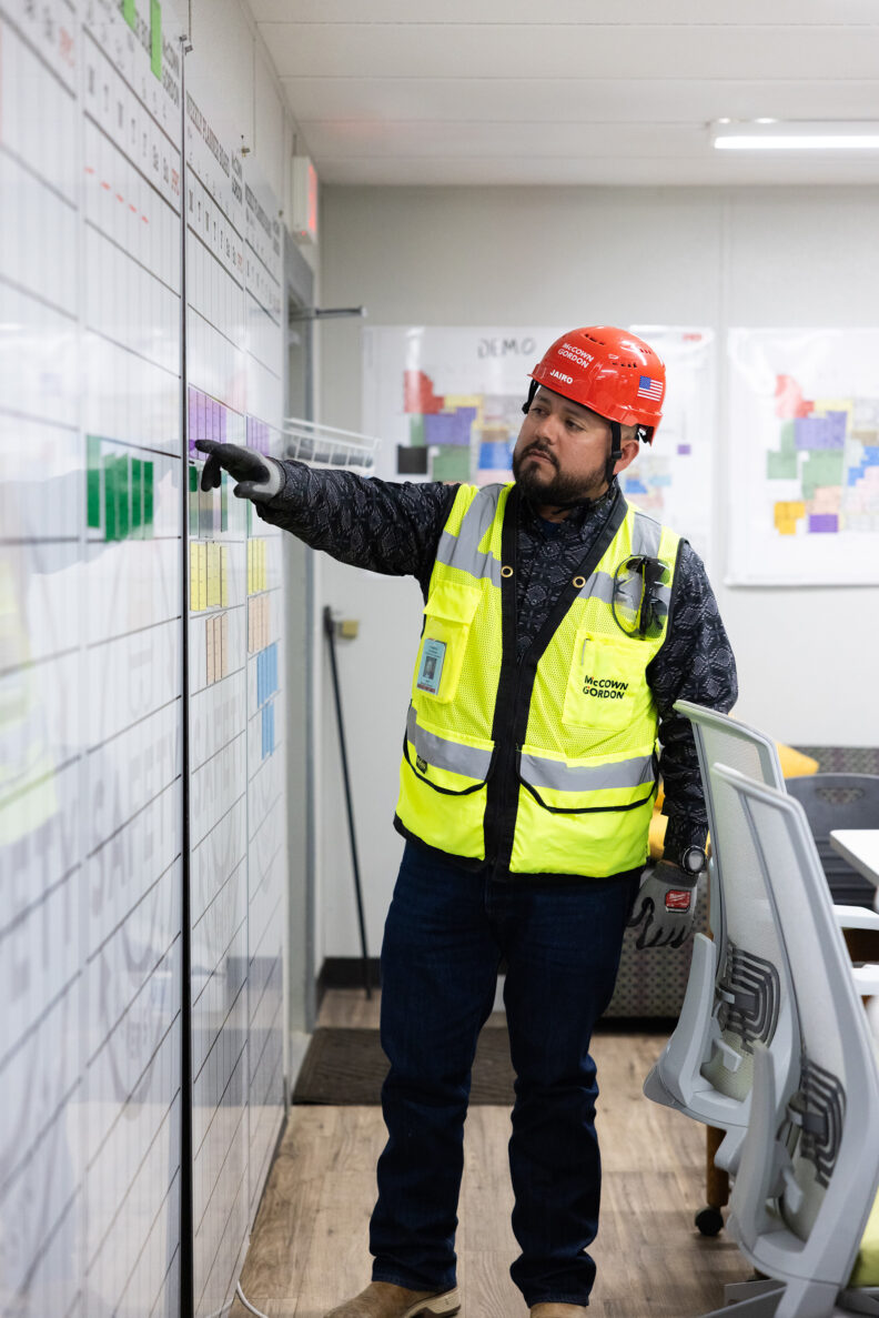 McCownGordon associate presenting on jobsite.