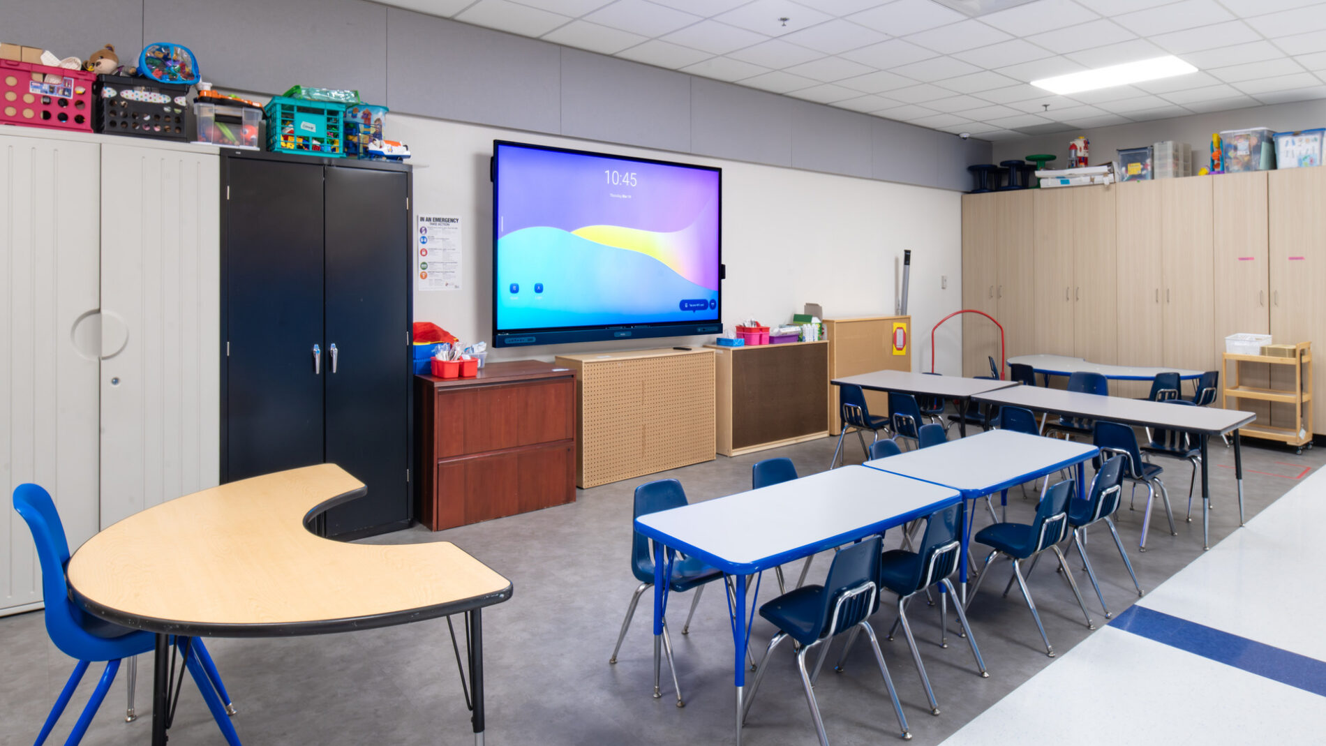 Desks and screen in classroom